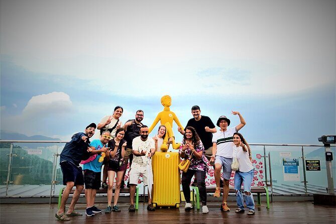 Busan Private Tour with licensed tour guide + private vehicle - Haeundae beach, Blue Line Park, and Dongbaek for sea-view momentum