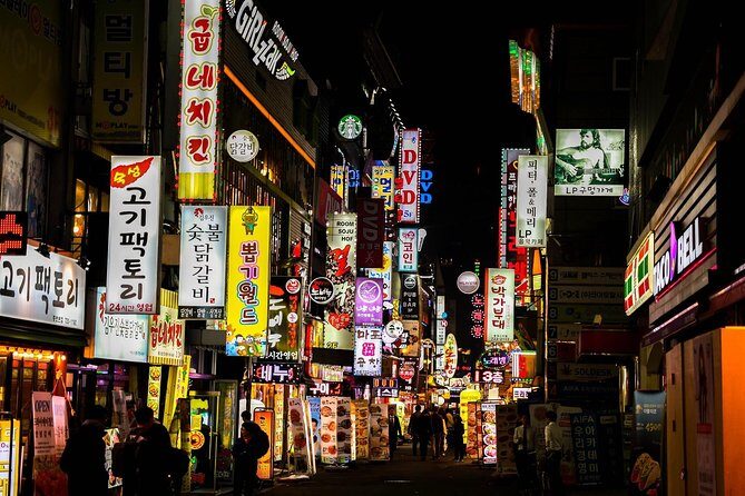 Downtown Seoul Guided Food & Market Tour with 8+ Local Tastings - Bukchon Hanok Village: Traditional Neighborhood Context, Not Just Photos