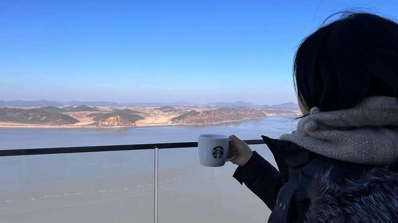 From Seoul: Aegibong Starbucks Observatory & DMZ View - Exhibition Hall at Aegibong: the big window and the videos