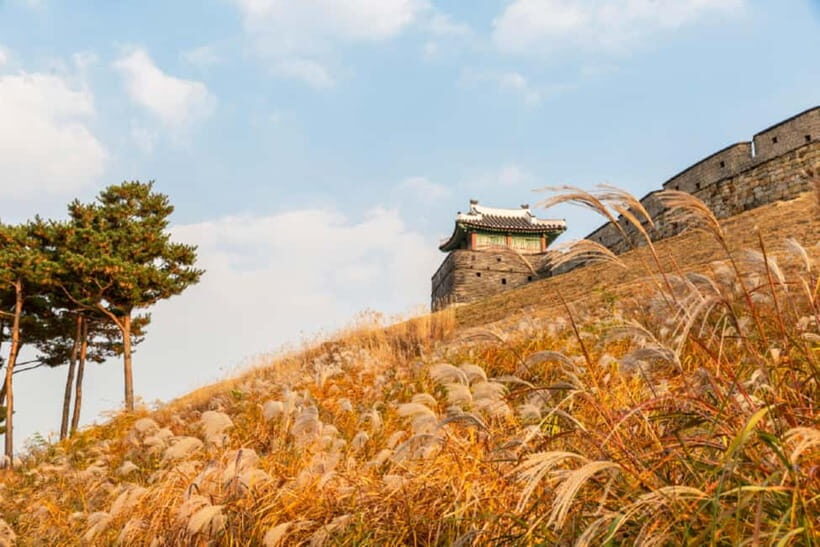 From Seoul: Suwon Hwaseong Fortress & Folk Village Tour - Suwon Hwaseong Fortress: UNESCO walls and the engineering story behind them