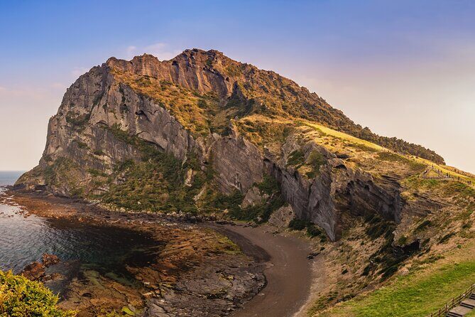 Jeju island Eastern UNESCO site Full Day Guided Tour - Getting to the first stop: Hamdeok Beach and Seoubong views